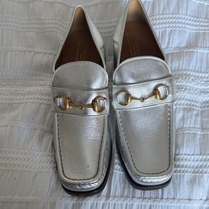 Gucci Women's Metallic Silver Loafers with Gold Accents